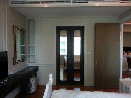 Wardrobe with mirror in the bedroom