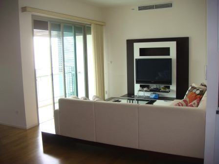 living area with flat screen TV 
