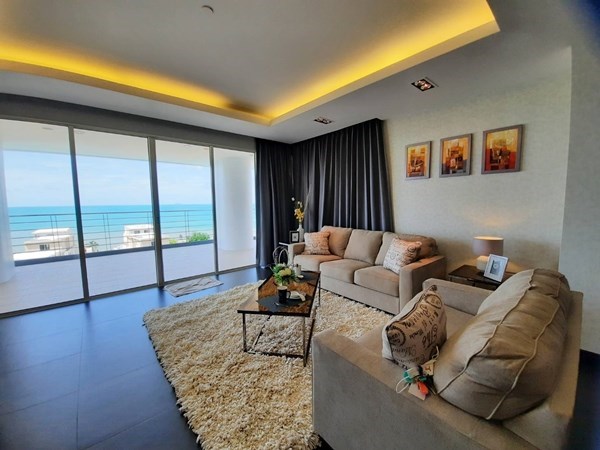 Modern style beachfront condo for sale with long term tenant