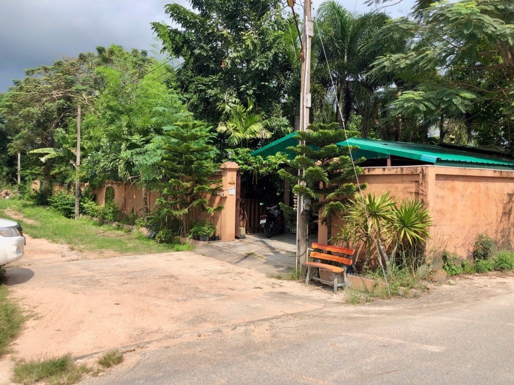 Main House and 2 guest cottages on 309 Talang Wah.