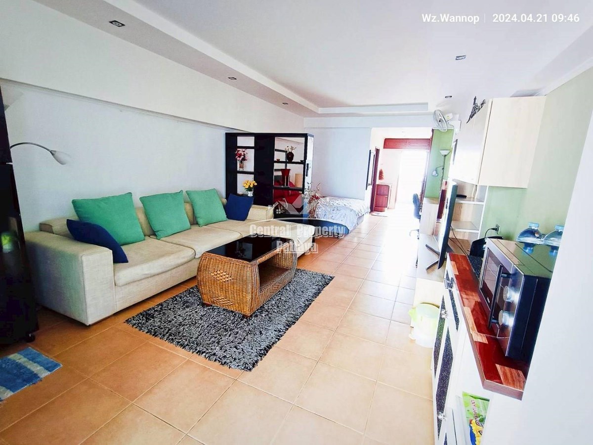 Beachfront Condominium in Wongamat Offering Spacious Living and Direct Sea Access.