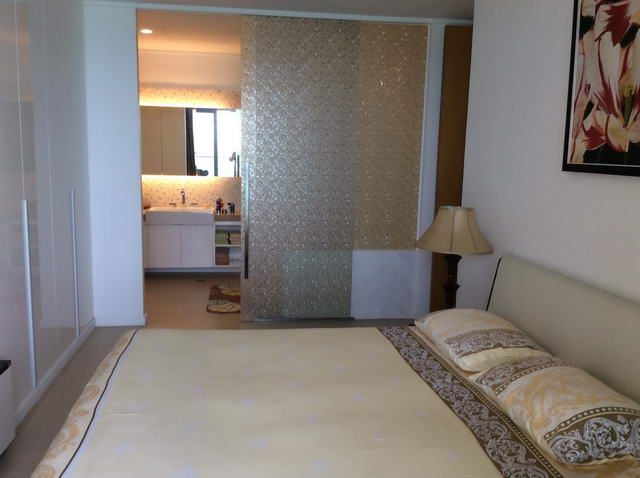 Condominium For Sale Northpoint Pattaya showing the master bedroom with en-suite