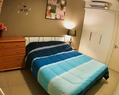 Condominium for sale UNIXX South Pattaya showing the bedroom with built-in wardrobe