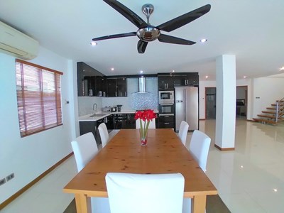 House for rent Jomtien Beach showing the dining, kitchen and guest bathroom