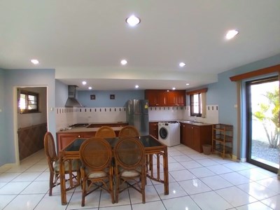 House for rent Pattaya showing the dining, kitchen and guest bathroom