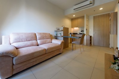 Condominium for rent UNIXX South Pattaya showing the living, dining and kitchen areas
