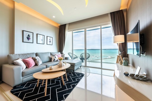 Condominium for sale Na Jomtien Pattaya showing the living room with sea view