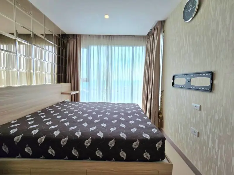 1 bed Condo near  Jomtien Beach view from the rooftop .Riviera Jomtien  a full range of facilities , such as a children's playground, rooftop pool with sunbeds, and a communal gym,