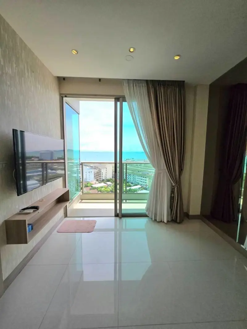 1 bed Condo near  Jomtien Beach view from the rooftop .Riviera Jomtien  a full range of facilities , such as a children's playground, rooftop pool with sunbeds, and a communal gym,