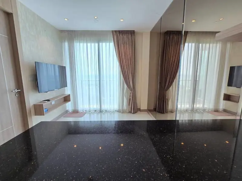1 bed Condo near  Jomtien Beach view from the rooftop .Riviera Jomtien  a full range of facilities , such as a children's playground, rooftop pool with sunbeds, and a communal gym,