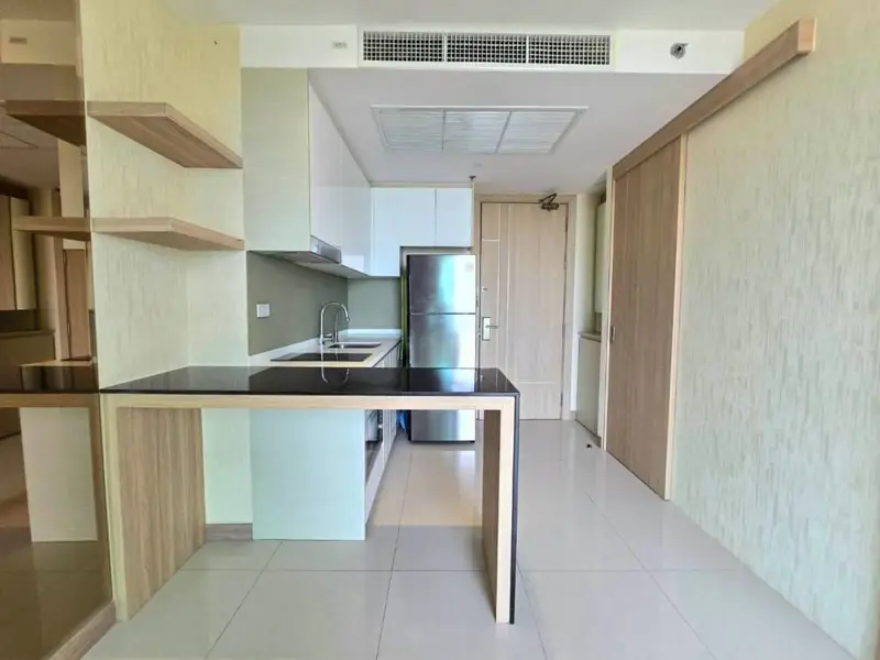 1 bed Condo near  Jomtien Beach view from the rooftop .Riviera Jomtien  a full range of facilities , such as a children's playground, rooftop pool with sunbeds, and a communal gym,