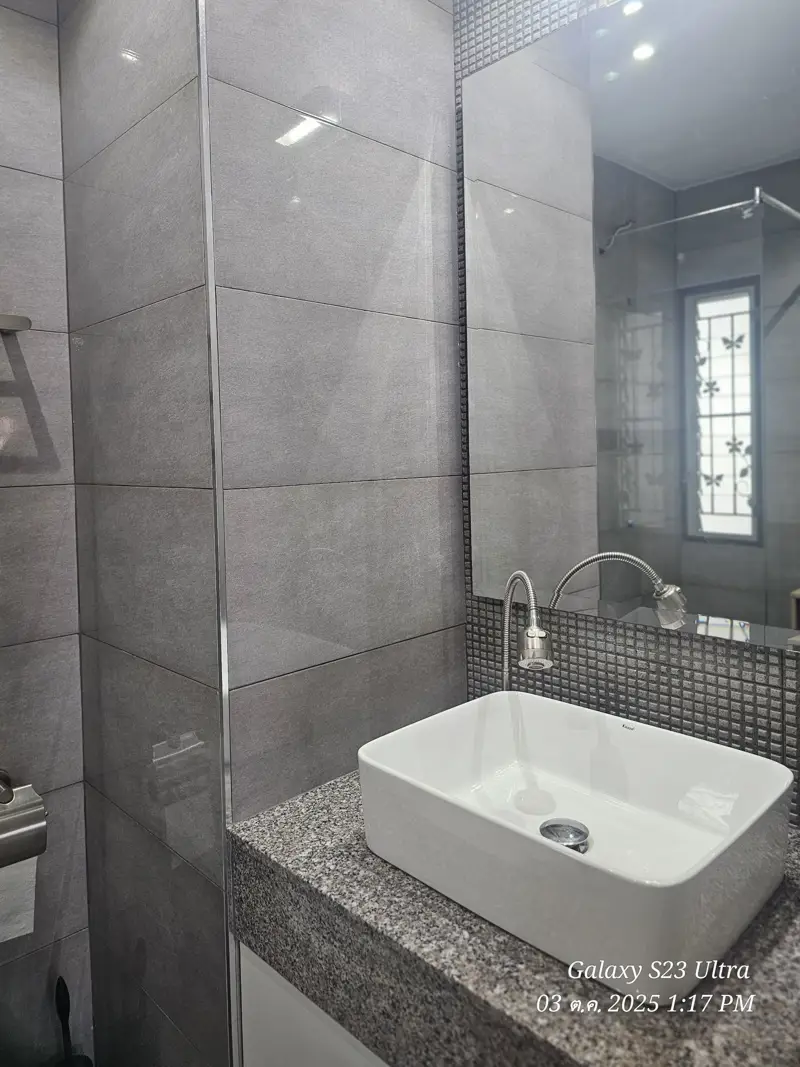 2 bed condo near Jomtien Beach with 3 swimming pools, 2 tennis courts, 2 sauna rooms, a fitness center, a playground, restaurants, and laundry service.