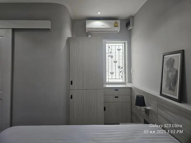 2 bed condo near Jomtien Beach with 3 swimming pools, 2 tennis courts, 2 sauna rooms, a fitness center, a playground, restaurants, and laundry service.