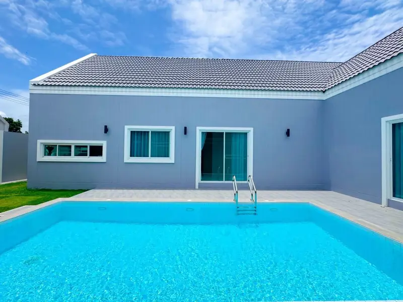 4 bed spacious home to buy in  East Pattaya, located near bustling beachfront areas, convenient access to amenities, international schools, golf courses, and a wide range of housing options,