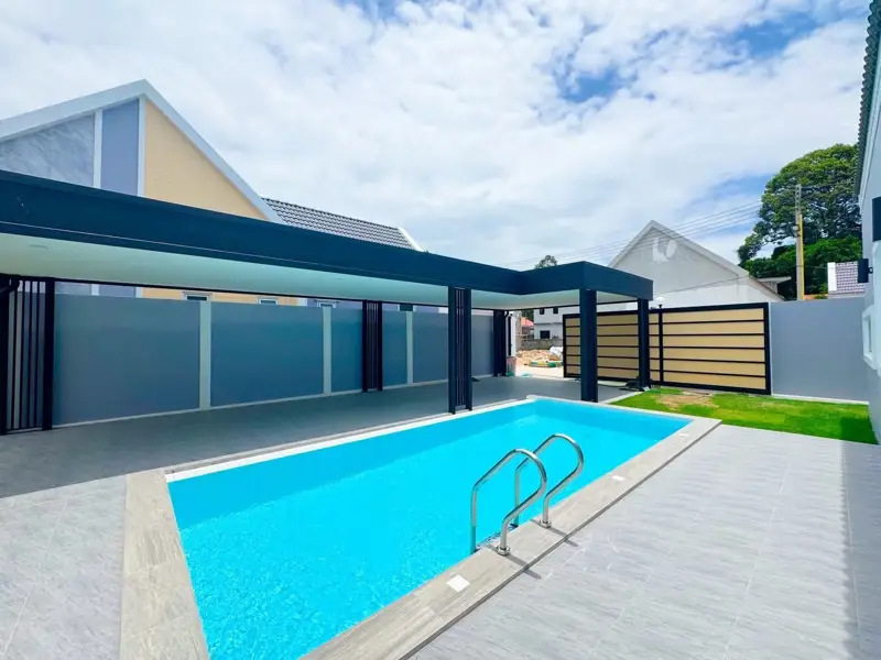 4 bed spacious home to buy in  East Pattaya, located near bustling beachfront areas, convenient access to amenities, international schools, golf courses, and a wide range of housing options,