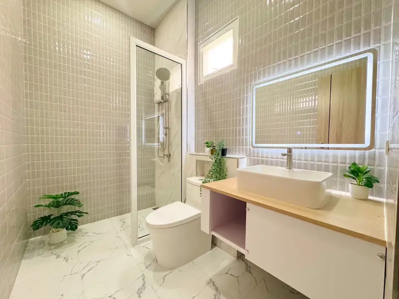 4 bed spacious home to buy in  East Pattaya, located near bustling beachfront areas, convenient access to amenities, international schools, golf courses, and a wide range of housing options,