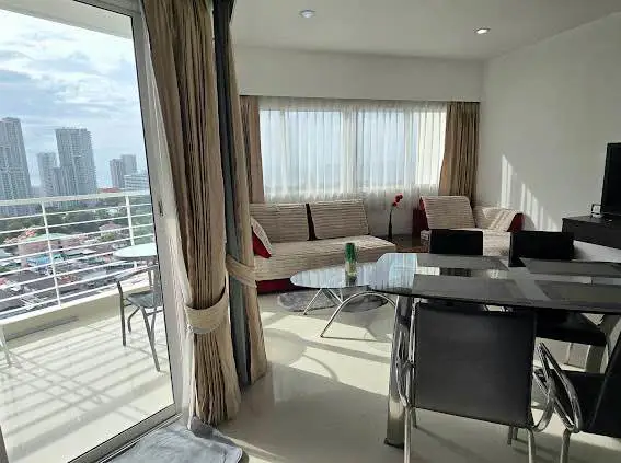  1 bed sea view condo Wongamat with facilities such as a swimming pool, fitness center, BBQ area, and on-site restaurant.
