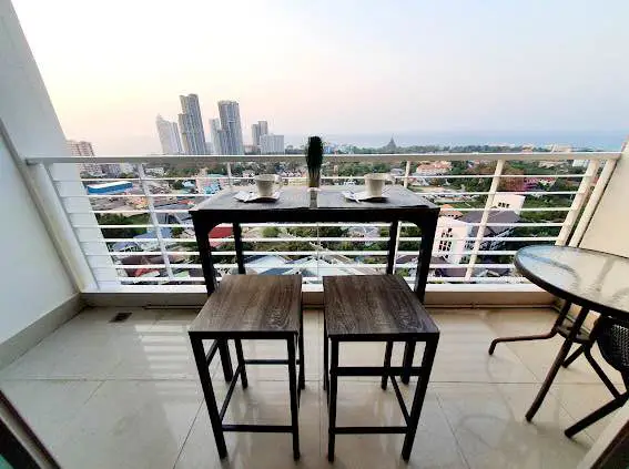  1 bed sea view condo Wongamat with facilities such as a swimming pool, fitness center, BBQ area, and on-site restaurant.