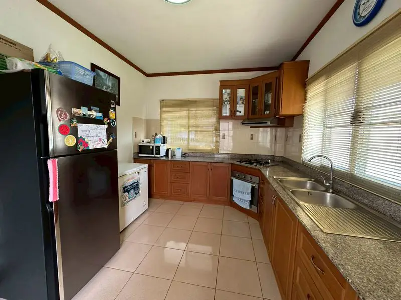 Soi Siam Country Club House for sale Pattaya Tropical 2, with a large open space, perfect for creating your dream garden or even adding a private swimming pool.