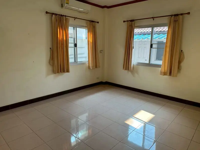 Soi Siam Country Club House for sale Pattaya Tropical 2, with a large open space, perfect for creating your dream garden or even adding a private swimming pool.