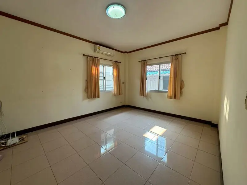 Soi Siam Country Club House for sale Pattaya Tropical 2, with a large open space, perfect for creating your dream garden or even adding a private swimming pool.