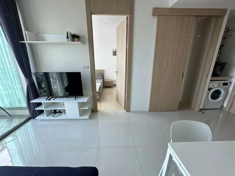 Riviera 1 bed Condo near to  stunning Jomtien Beach view from the rooftop  children's playground, rooftop pool with sunbeds, and a communal gym