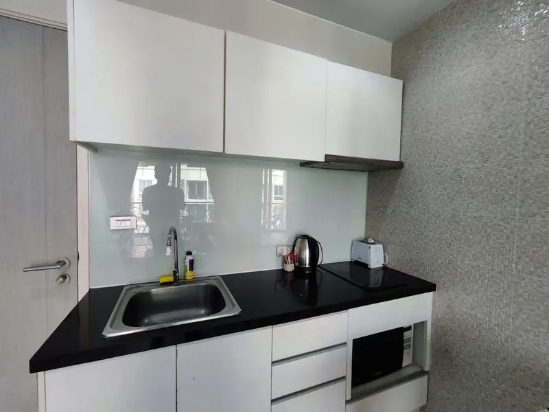  1 bed Condo Jomtien with model beach, waterfall curtain pool, river bridge, giant ship, or a children's water park. 