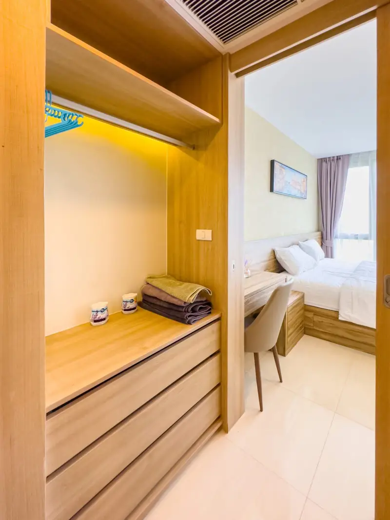 Riviera Wong Amat 1 Bedroom for sale luxury facilities including multiple swimming pools (including infinity edge sky pools), a fully-equipped gym, gardens, a kids' club, games room, 24-hour security