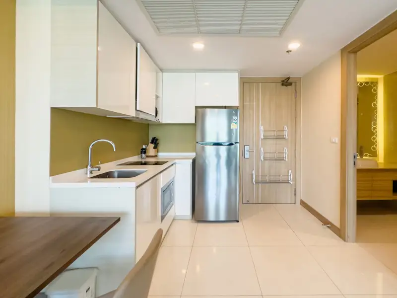 Riviera Wong Amat 1 Bedroom for sale luxury facilities including multiple swimming pools (including infinity edge sky pools), a fully-equipped gym, gardens, a kids' club, games room, 24-hour security