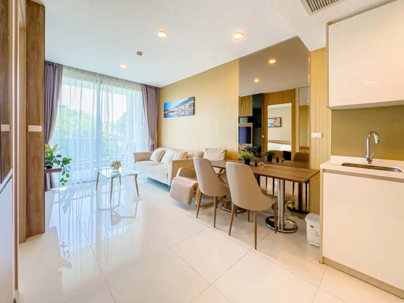 Riviera Wong Amat 1 Bedroom for sale luxury facilities including multiple swimming pools (including infinity edge sky pools), a fully-equipped gym, gardens, a kids' club, games room, 24-hour security