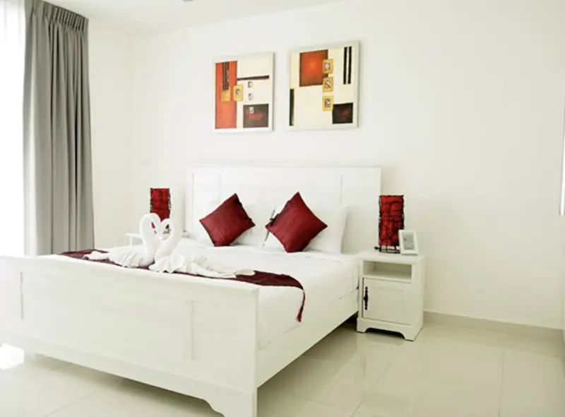 Luxury resort style condo for sale  Wongamat  with 1,000 square meter tropical lagoon pool Lush tropical gardens, boardwalks, waterslide Direct access to Wong Amat beach