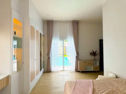 4 bed spacious home to buy in  East Pattaya, located near bustling beachfront areas, convenient access to amenities, international schools, golf courses, and a wide range of housing options,