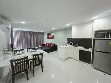  1 bed condo Wongamat with Well Equiped  fitness room on the rooftop that offers great sea and city views.  There are also 2 large communal pools on the ground floor.