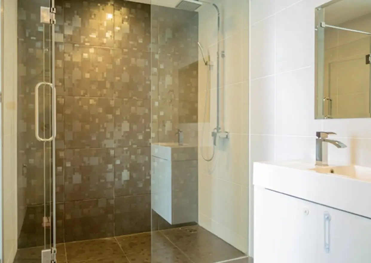 Luxury resort style condo for sale  Wongamat  with 1,000 square meter tropical lagoon pool Lush tropical gardens, boardwalks, waterslide Direct access to Wong Amat beach