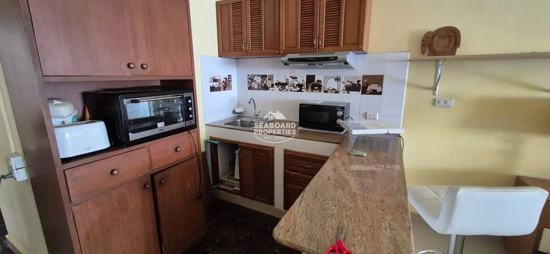 Jomtien Complex Condominium Compact Kitchenette Area & Storage Cabinets | Jomtien Rental Condo