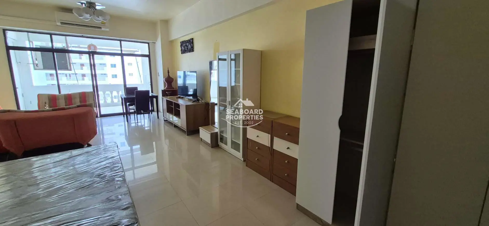 Jomtien Complex Condominium Spacious Living Room & Natural Light Windows