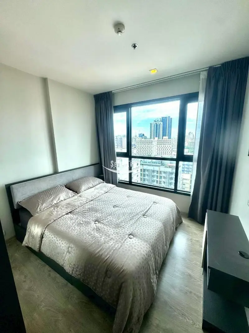 Comfortable bedroom with city view