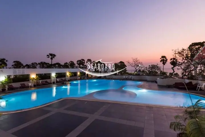 Communal beachside swimming pool at Jomtien Plaza Condotel Beachfront 