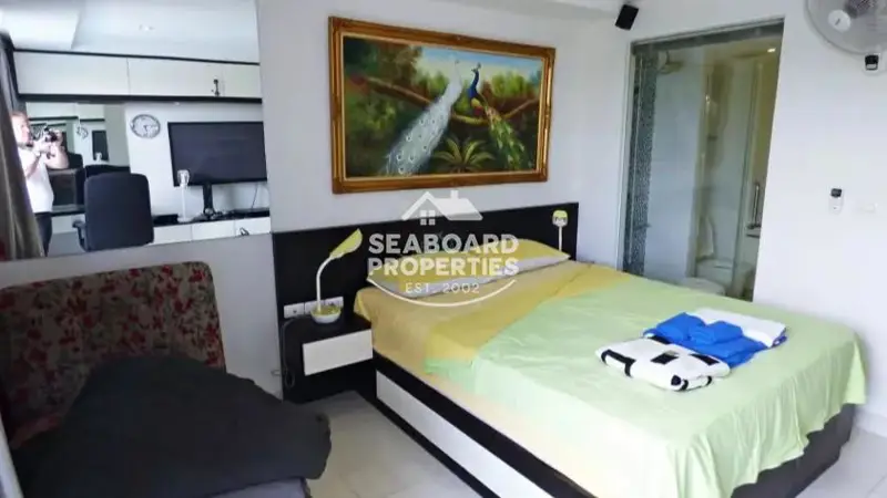 Novana Residence Pattaya Bright Studio Bedroom Area & Window View | Apartment for Sale