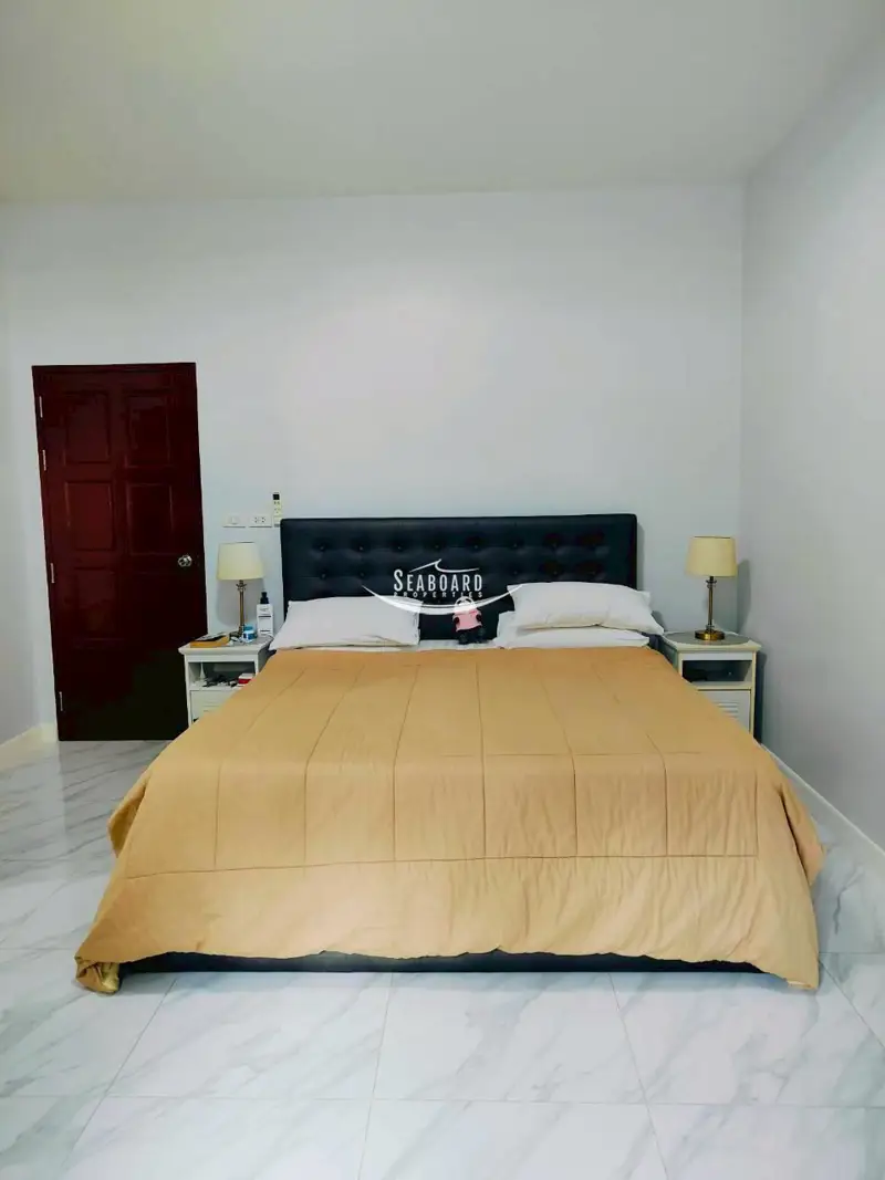 Sophisticated Master Bedroom Suite with Pool View Access