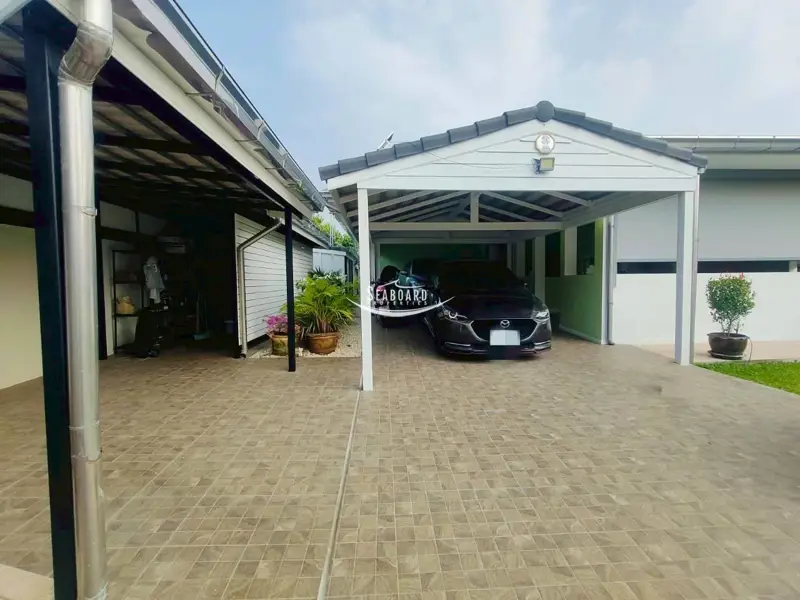 Secure Covered Double Carport & Elegant Entrance