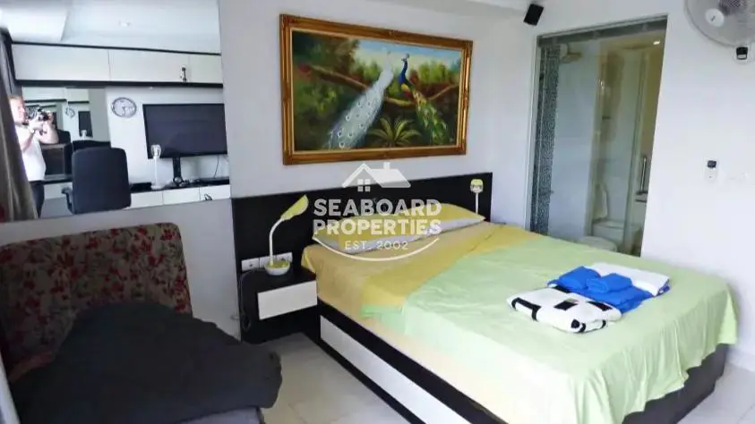 Novana Residence Pattaya Bright Studio Bedroom Area & Window View | Apartment for Sale