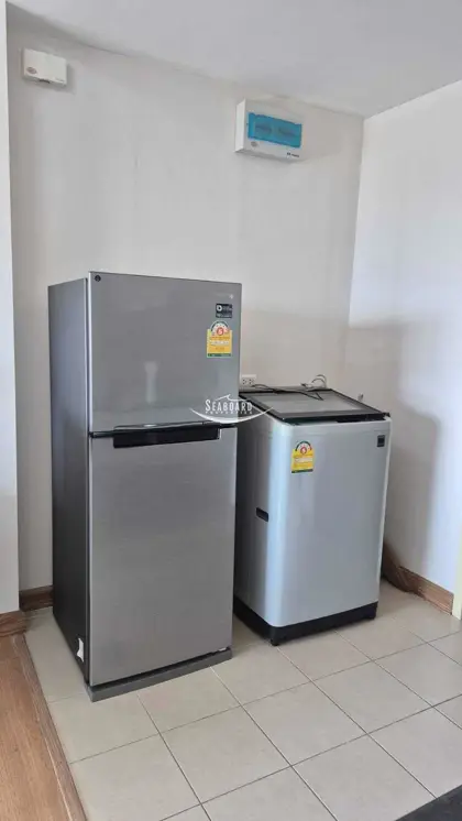 Dedicated Utility Area with Refrigerator & Washing Machine Setup