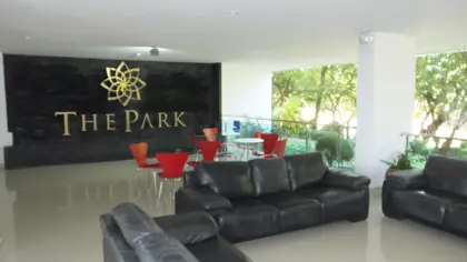 The Park Condominium Jomtien for Sale and Rent - Entrance Lobby Signage and Lounge Area
