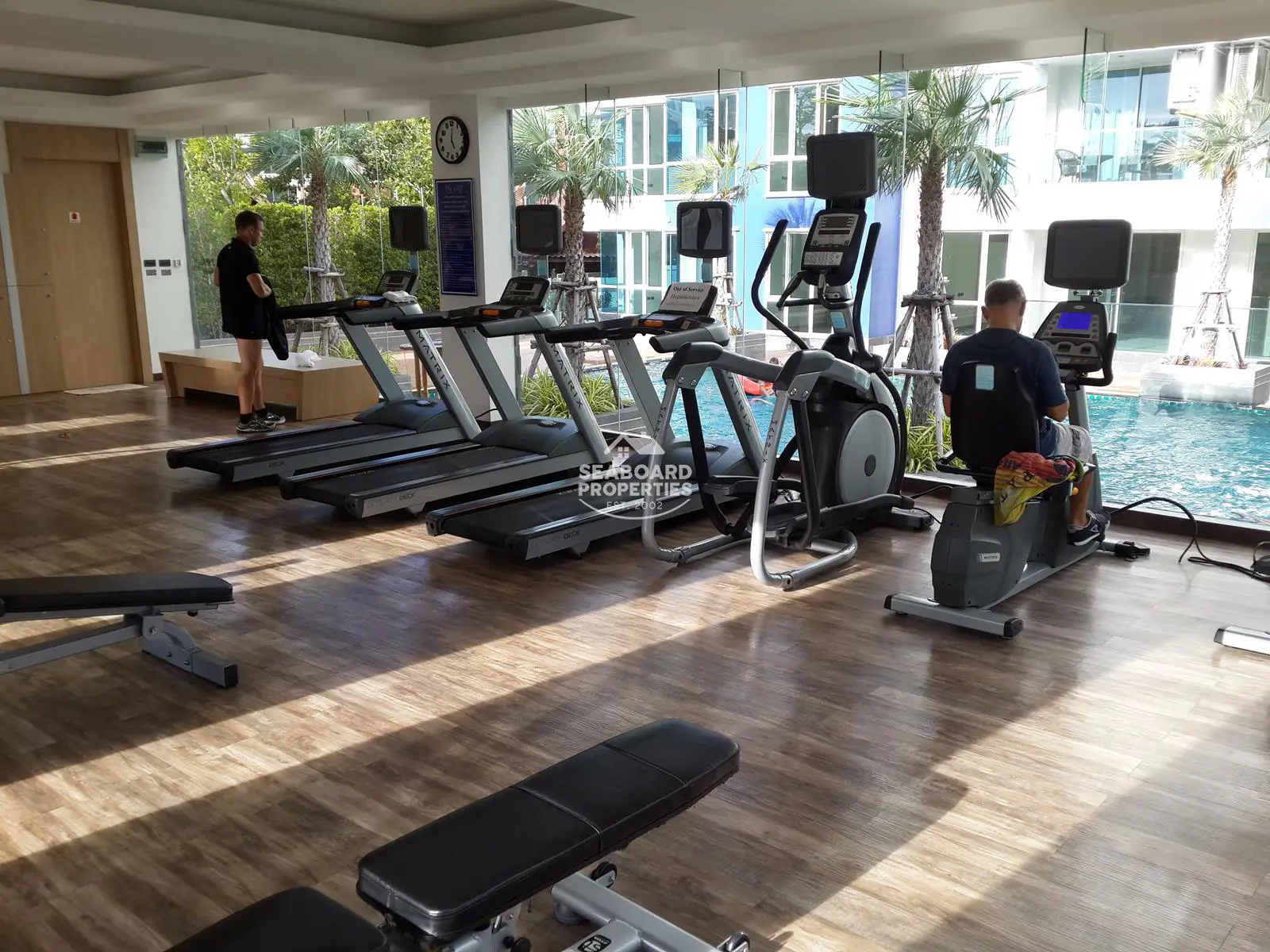 The Cliff Residence Fully Equipped Fitness Center Overlooking the Pool