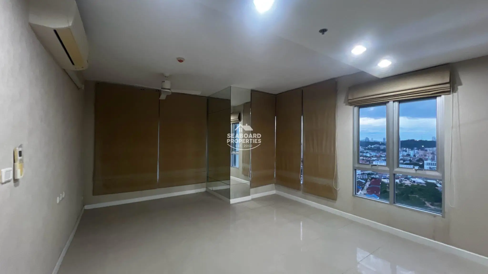 Unicca Condominium Bright Living Space with Large Windows
