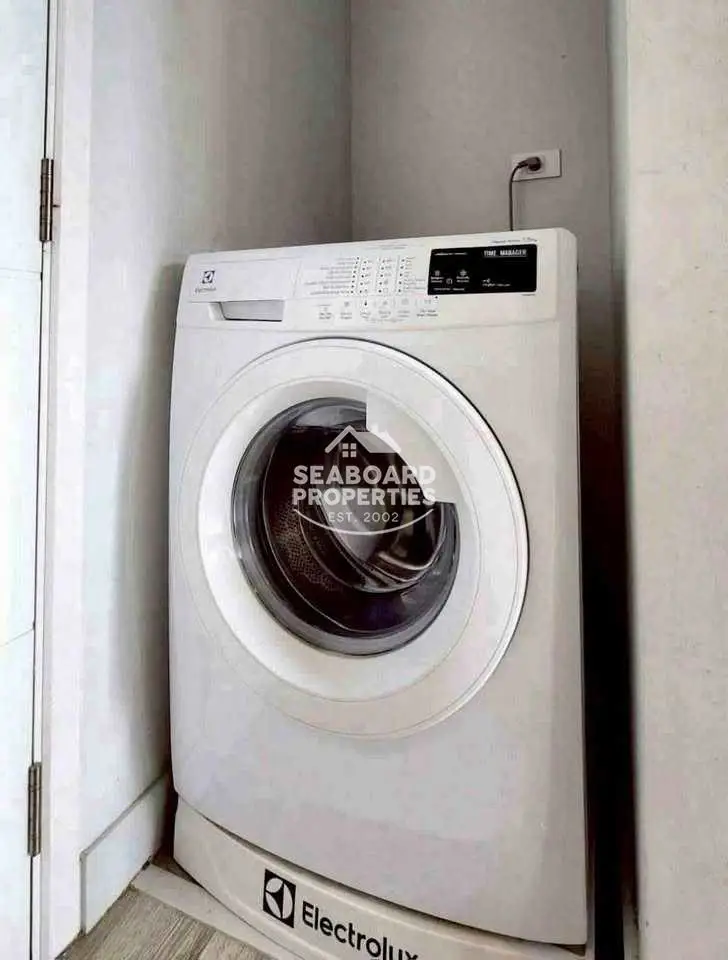 Centric Sea Condominium Washing Machine Zone