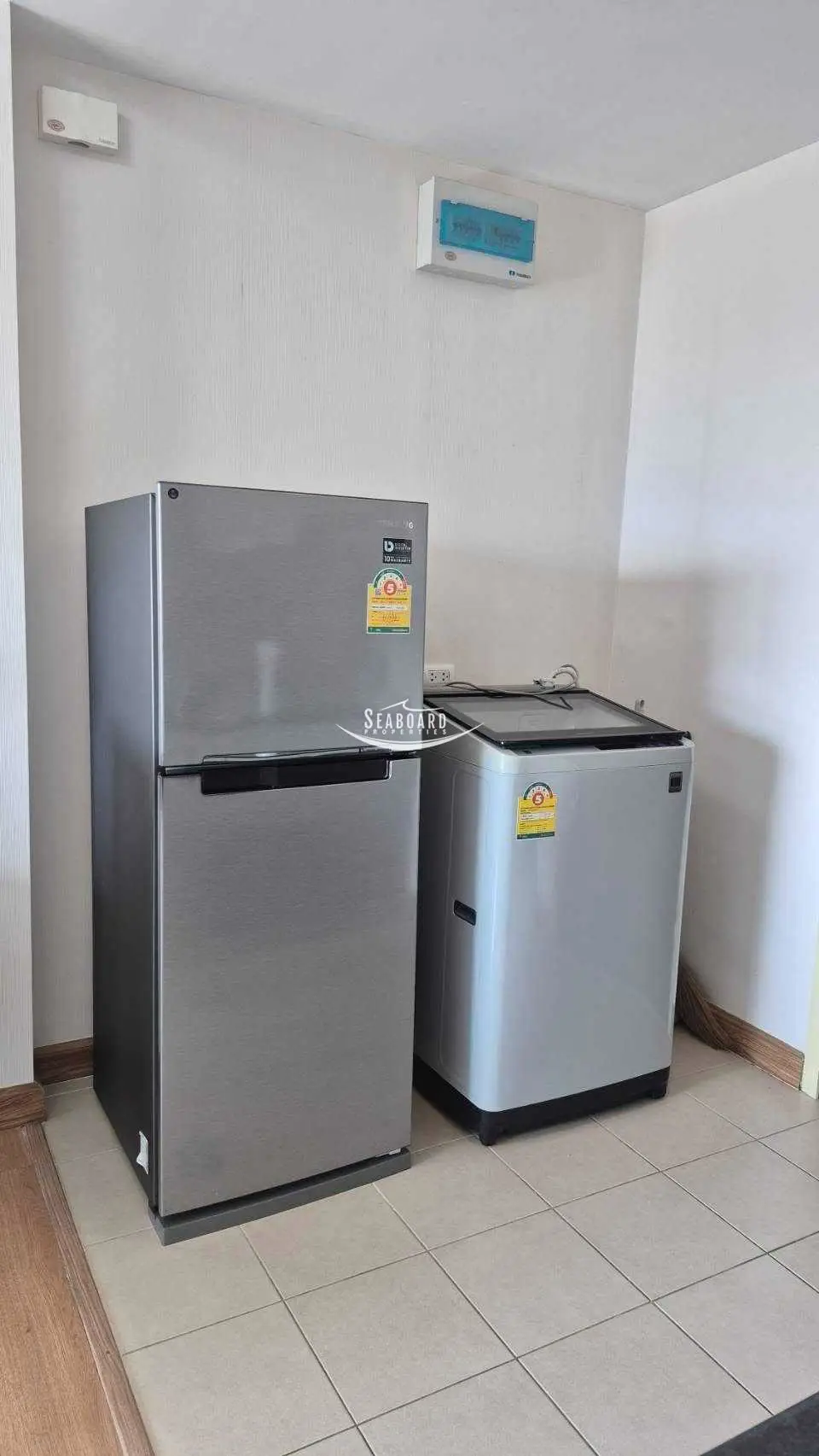 Dedicated Utility Area with Refrigerator & Washing Machine Setup