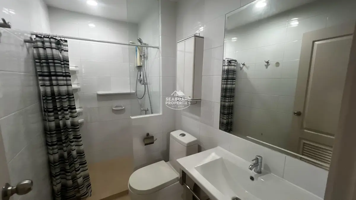 Unicca Condominium Shower Enclosure Bathroom Area