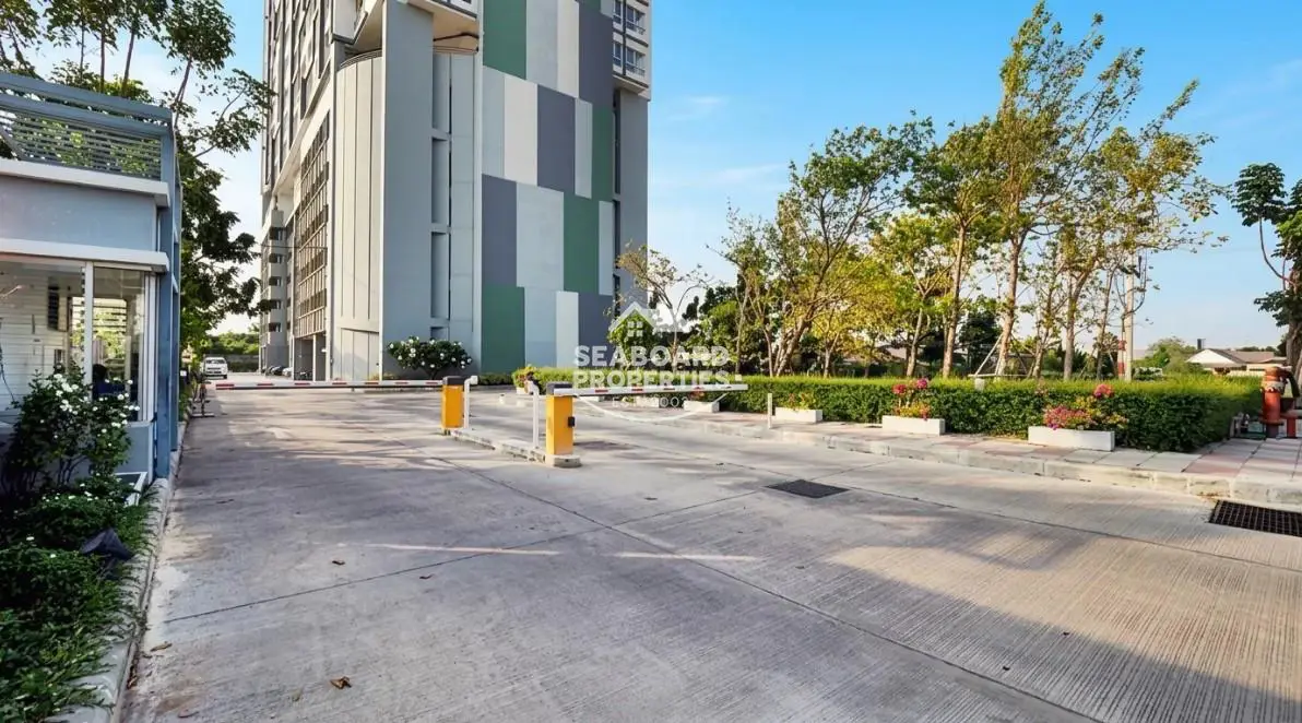 Unicca Condo entrance and landscaped grounds